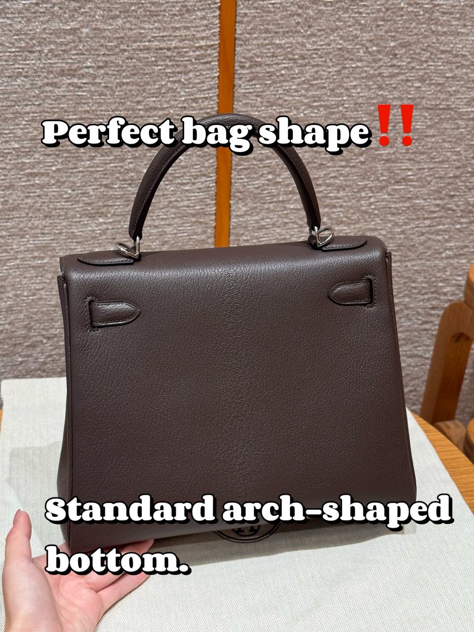 Brown custom leather top-handle bag, rear view