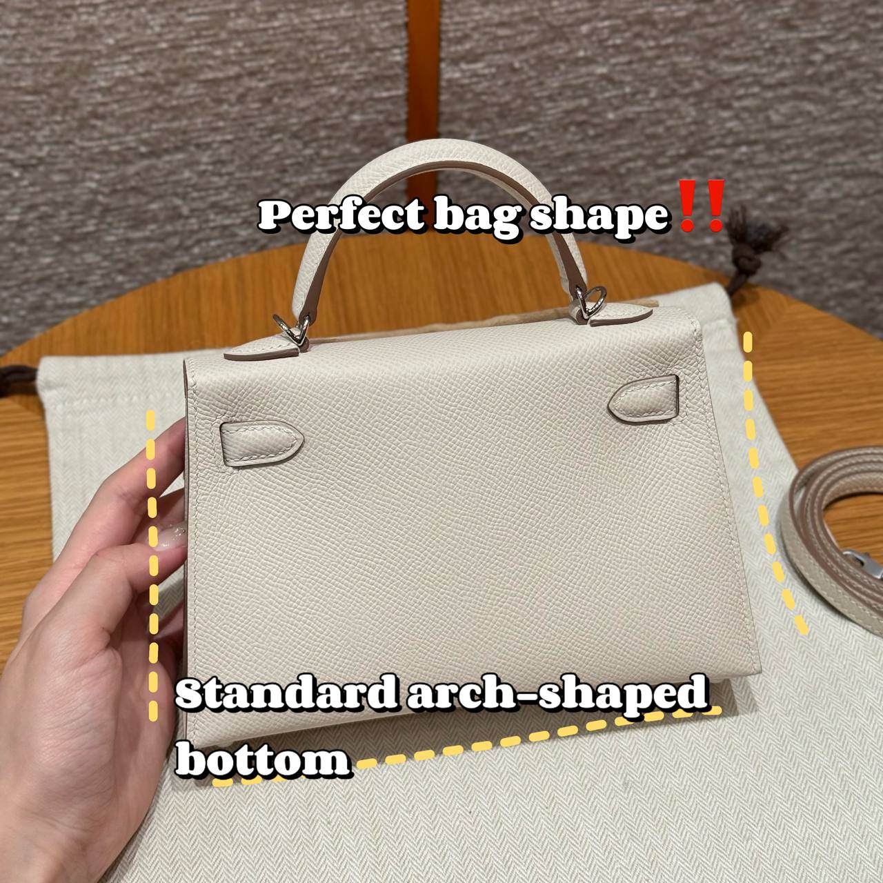 Cream custom leather top-handle bag, rear view