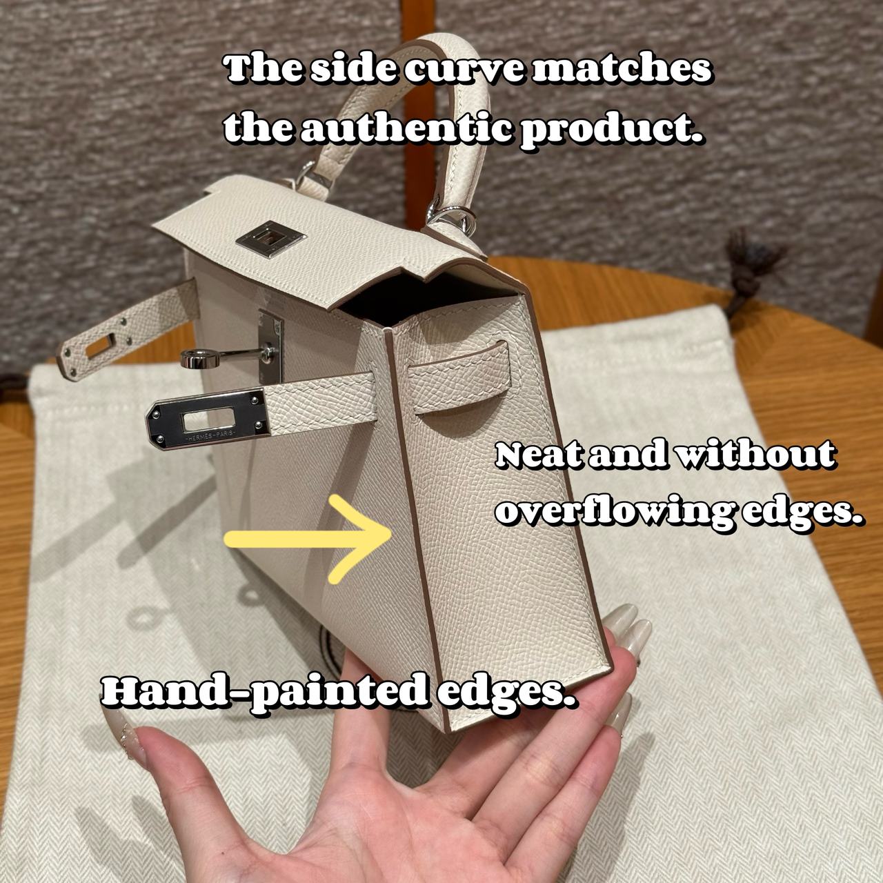 Cream custom leather top-handle bag with hand-finished details